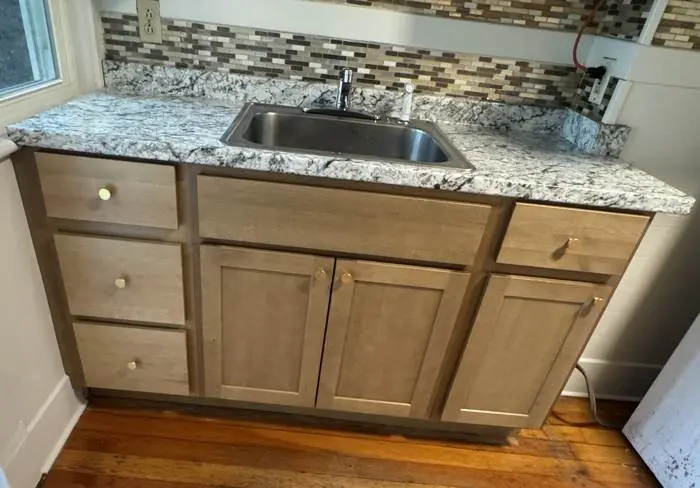 Repaired kitchen cabinets after