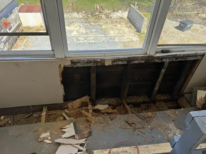 Rotted window sill before repair